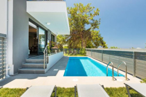 Nisos Villa, walking distance to the beach & shops, By ThinkVilla